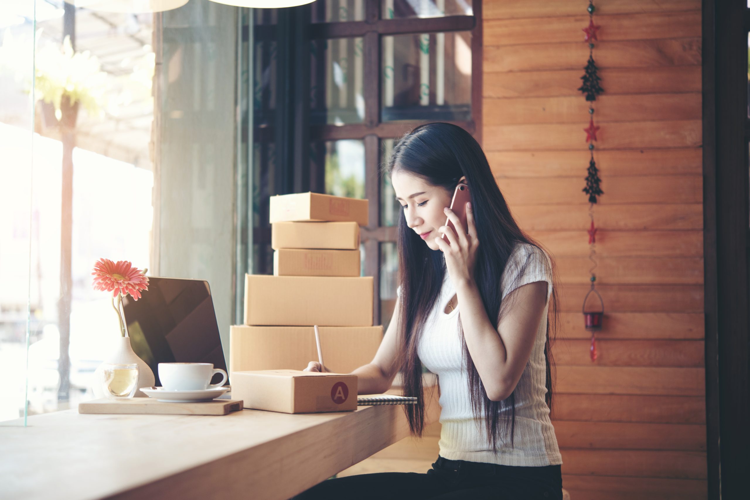 beautiful-woman-working-coffee-shop-scaled